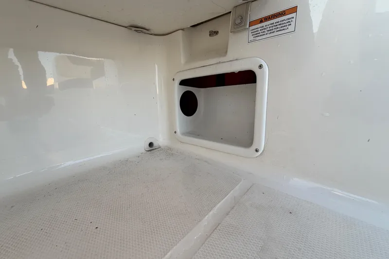 Slide: The Image of 2019 Bayliner Element E16 interior compartment with warning label. - 49