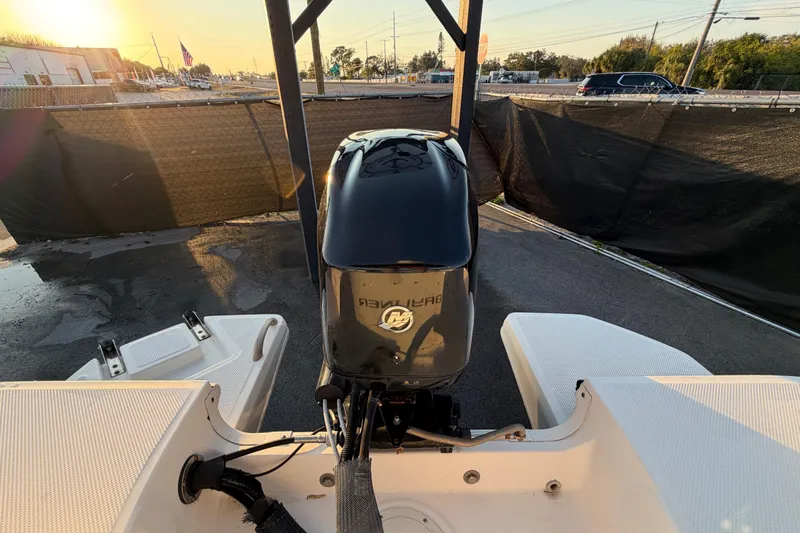 Slide: The Image of 2019 Bayliner Element E16 boat with outboard motor at sunset. - 53