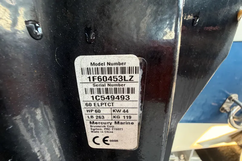 Slide: The Image of Label on a 2019 Bayliner Element E16 boat, showing model and serial numbers. - 59