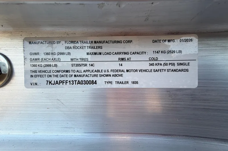 Slide: The Image of 2019 Bayliner Element E16 trailer label, showing specifications and compliance details. - 62