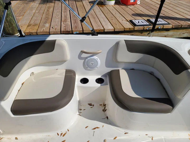 Slide: The Image of 2019 Bayliner Element E16 boat on trailer at sunset, outdoor display. - 9