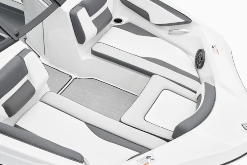 Slide: The Image of 2026 Yamaha Boats SX195 interior with sleek white and gray seating design. - 2