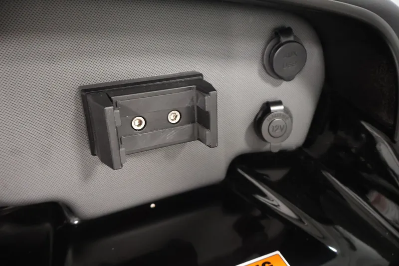 Slide: The Image of 2026 Yamaha Boats SX195 dashboard with AUX and 12V ports. - 26