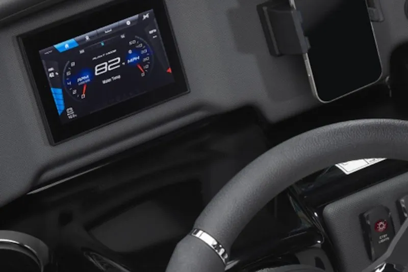 Slide: The Image of Dashboard of 2026 Yamaha Boats SX195 featuring digital speedometer and steering wheel. - 7