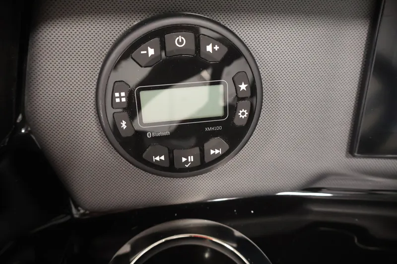 Slide: The Image of Control panel of 2026 Yamaha Boats SX195 with Bluetooth and audio features. - 24