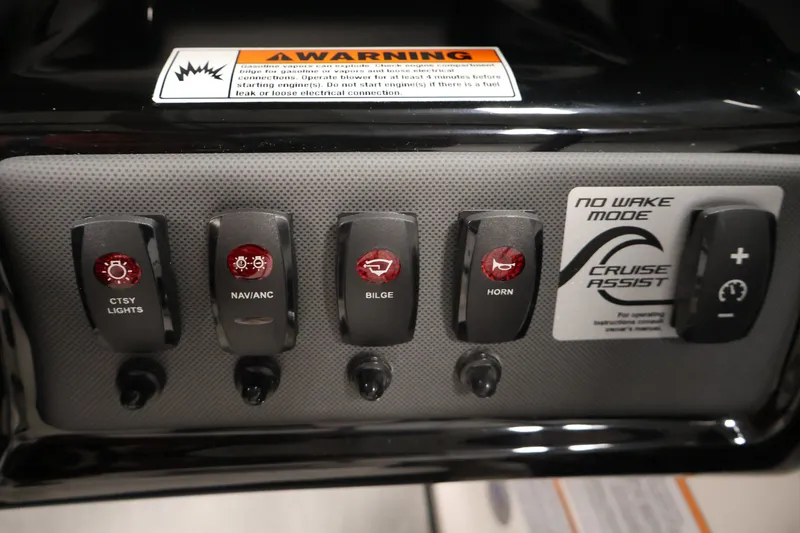 Slide: The Image of Control panel of 2026 Yamaha SX195 boat featuring various switches and cruise assist mode. - 28