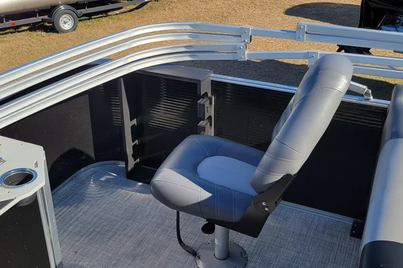 Slide: The Image of 2020 Crestliner 200 Rally DX CS boat interior with gray seating and railing. - 7