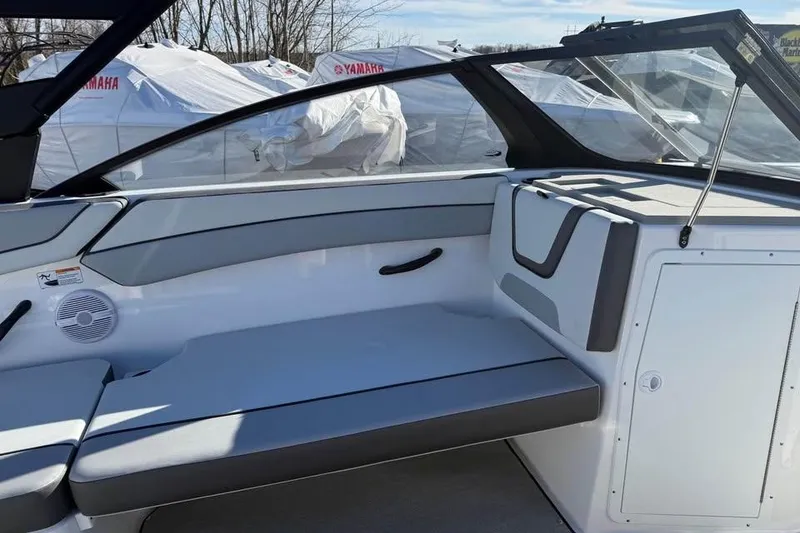 Slide: The Image of 2026 Yamaha Boats AR220 interior with sleek seating and modern design. - 10