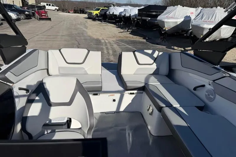 Slide: The Image of 2026 Yamaha Boats AR220 interior with modern seating and sleek design. - 14