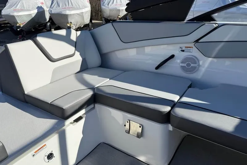 Slide: The Image of 2026 Yamaha Boats AR220 interior seating with modern design and comfortable cushions. - 15