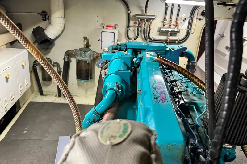 Slide: The Image of Engine room of a 1918 Peterson Tugboat with Daytona Marine Diesel engine. - 15