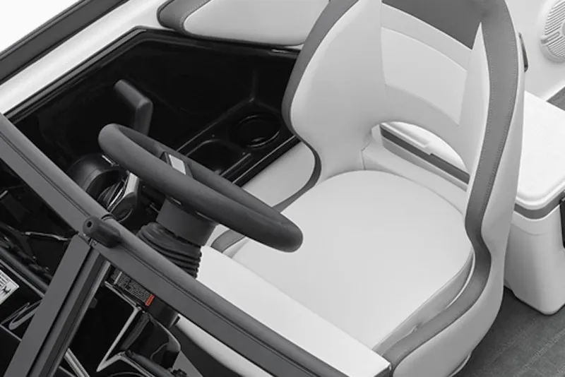 Slide: The Image of 2014 Yamaha Boats SX190 cockpit with steering wheel and comfortable seating. - 8