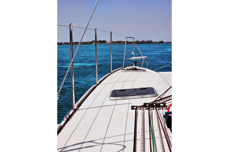 Slide: The Image of Seawind 1160XL 2026 catamaran deck with ocean view and clear blue skies. - 6