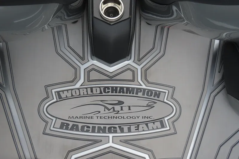 Slide: The Image of MTI 390X 2025 World Champion Racing Team logo on sleek boat surface. - 27