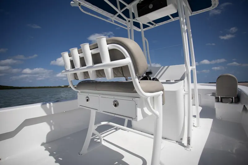 Slide: The Image of Manufacturer Provided Image: Savannah SS21 2025 boat with seating and storage on open water. - 11