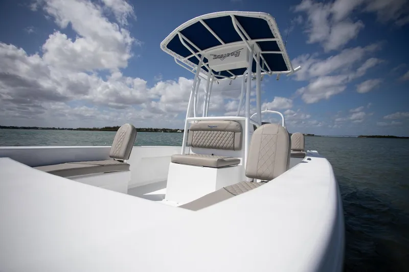 Slide: The Image of Manufacturer Provided Image: Savannah SS21 boat 2025 on calm water under blue sky. - 13