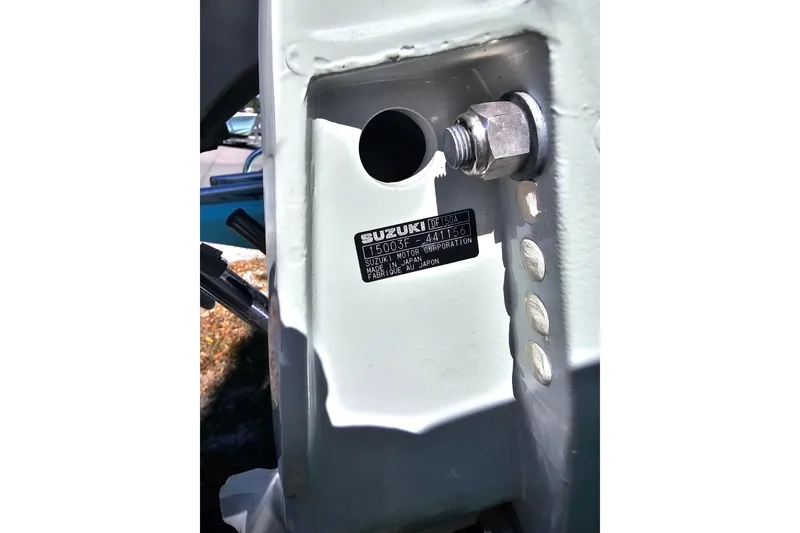 Slide: The Image of Close-up of a Savannah SS21 2025 engine component with Suzuki label. - 5