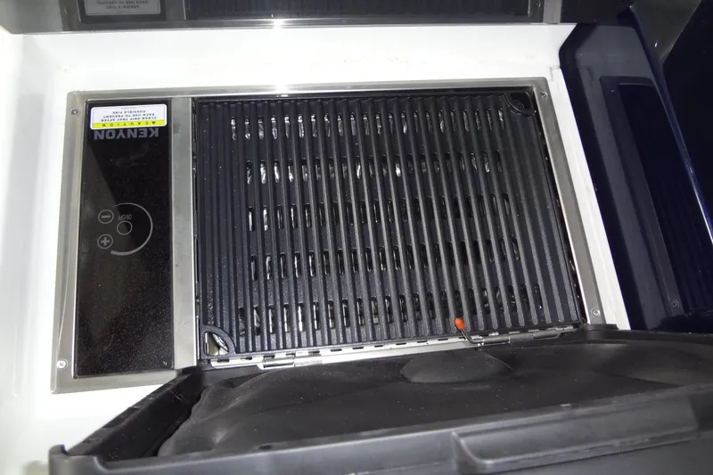 Slide: The Image of Kenyon grill on 2023 Formula 380 Super Sport Crossover I/O boat. - 27