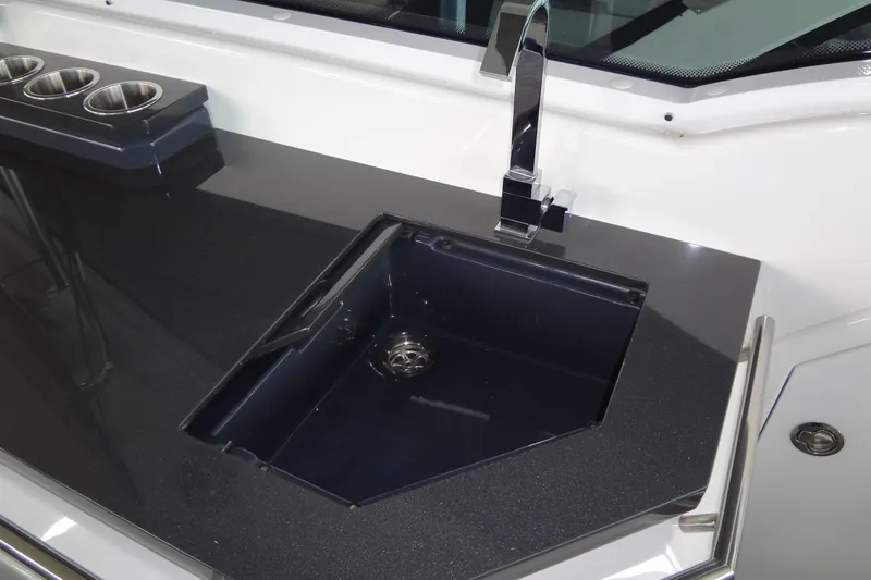 Slide: The Image of Luxury sink area on 2023 Formula 380 Super Sport Crossover I/O boat. - 32