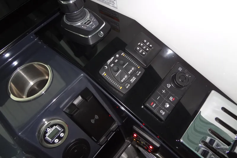 Slide: The Image of 2023 Formula 380 Super Sport Crossover I/O storage compartments, sleek design, white finish. - 40