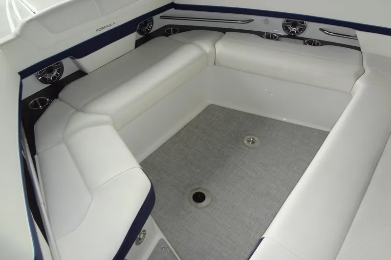 Slide: The Image of 2023 Formula 380 Super Sport Crossover I/O interior with plush seating and audio system. - 47