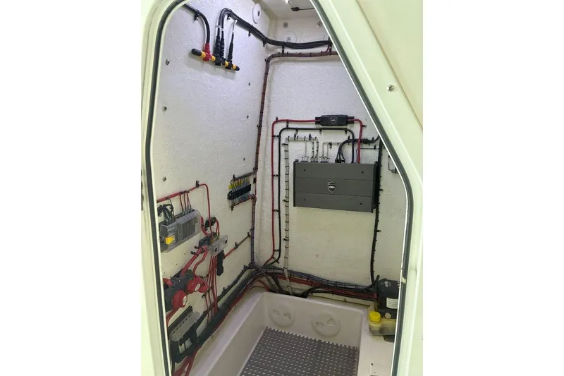 Slide: The Image of Electrical wiring setup inside 2023 Xplor X24 model, showcasing organized cables and components. - 15