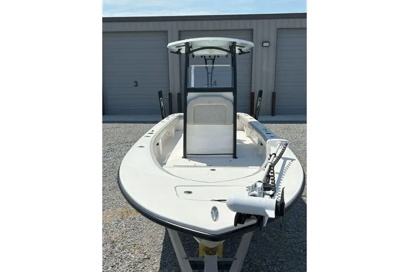 Slide: The Image of 2023 Xplor X24 boat in storage, featuring a sleek design and modern equipment. - 5