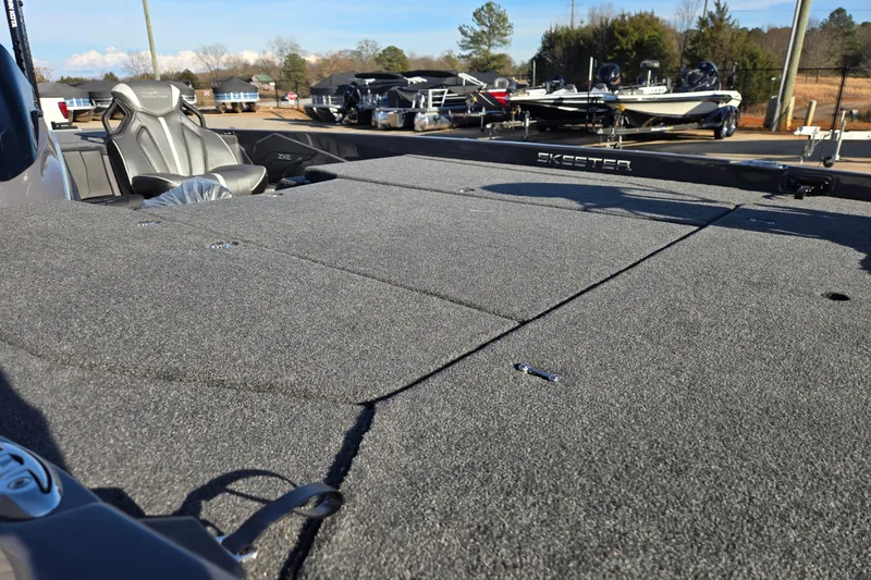 Slide: The Image of 2026 Skeeter ZXE21 boat with spacious deck and comfortable seating. - 17