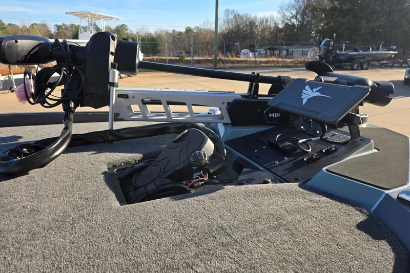 Slide: The Image of 2026 Skeeter ZXE21 boat deck with advanced control panel and equipment. - 19