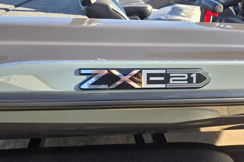 Slide: The Image of 2026 Skeeter ZXE21 boat emblem in sunlight, showcasing sleek design. - 40