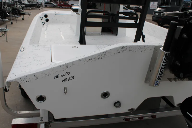 Slide: The Image of 2026 Freedom Boats 16' Eagle, white hull, "No Wood No Rot" text, on trailer. - 6