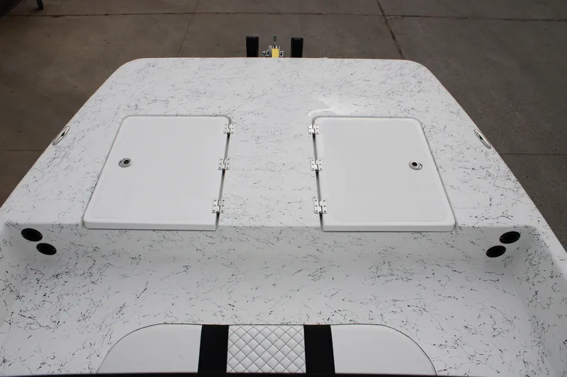 Slide: The Image of 2026 Freedom Boats 16' Eagle deck with storage compartments and sleek design. - 8