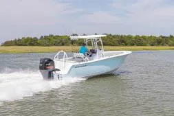 Slide: The Image of 2020 Sportsman Heritage 231 Center Console boat with spacious seating and modern design. - 13