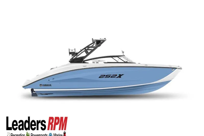 The Image of 2025 Yamaha Boats 252XE, sleek blue and white design, side view. - 0