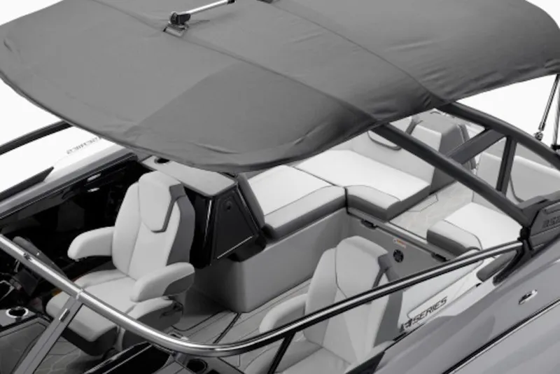 Slide: The Image of 2025 Yamaha Boats 252XE interior with seating and canopy, showcasing modern design and comfort. - 3
