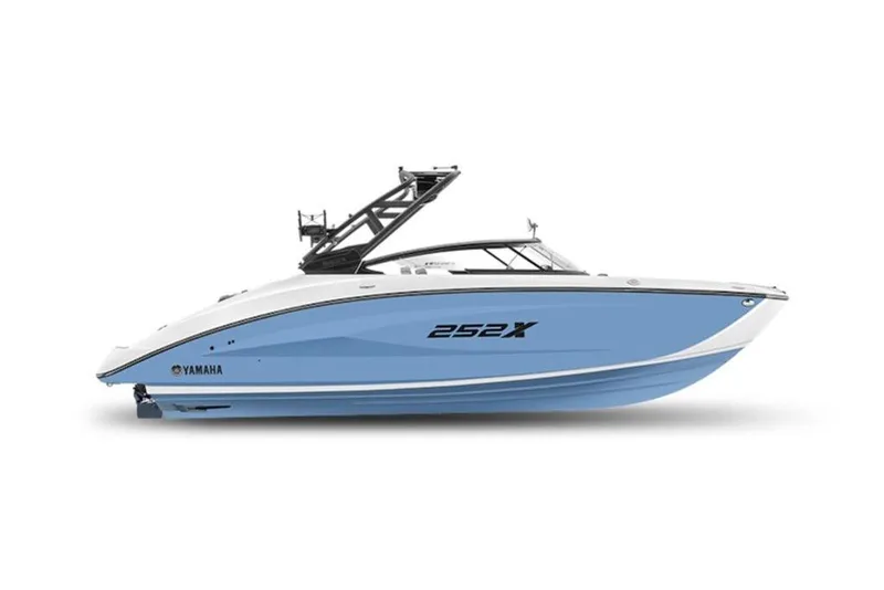 Slide: The Image of 2025 Yamaha Boats 252XE, sleek blue and white design, side view. - 8