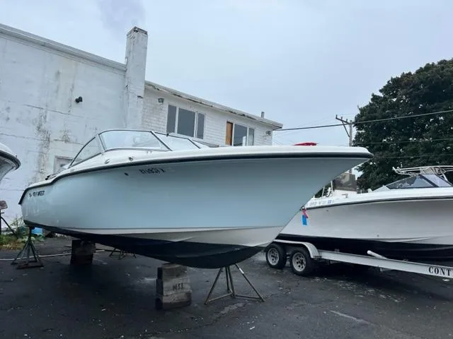 The Image of 2020 Key West 239 DFS boat on stands in a parking lot. - 0