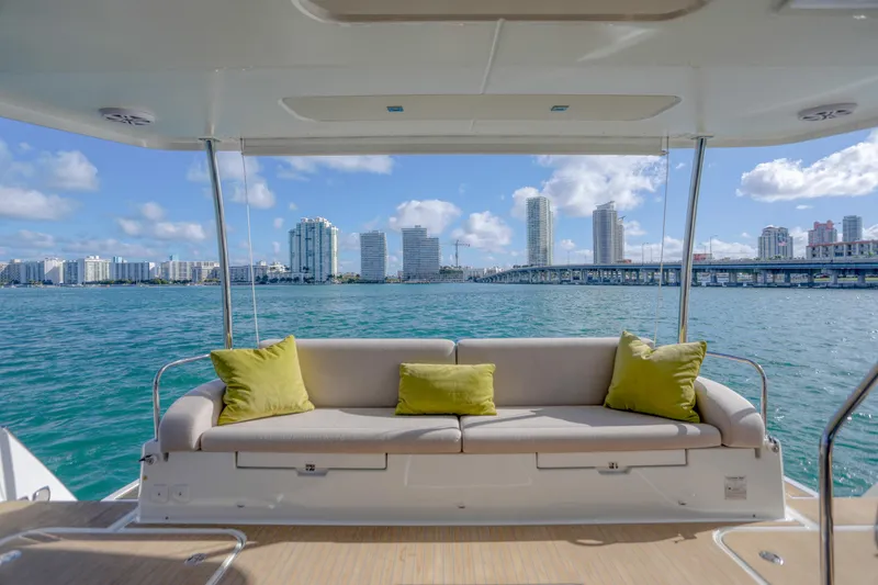 Slide: The Image of Luxurious 2022 Fountaine Pajot MY6 yacht with scenic city skyline view. - 19
