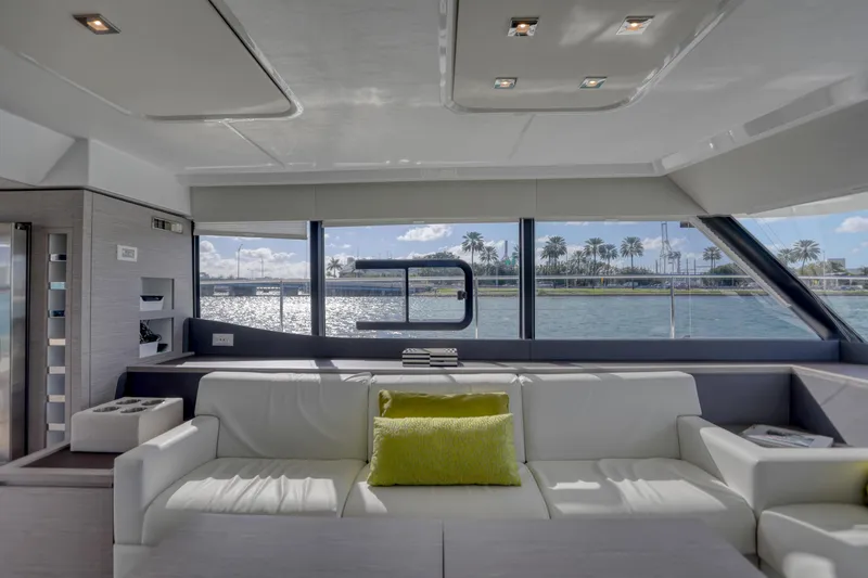 Slide: The Image of Luxurious interior of 2022 Fountaine Pajot MY6 yacht with waterfront view. - 28