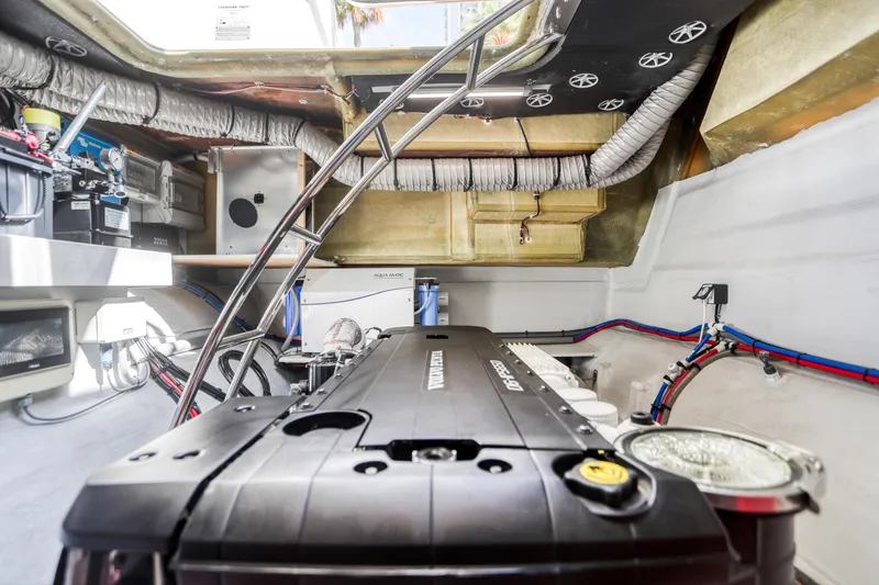 Slide: The Image of Engine room of 2022 Fountaine Pajot MY6 yacht, showcasing mechanical components and wiring. - 45