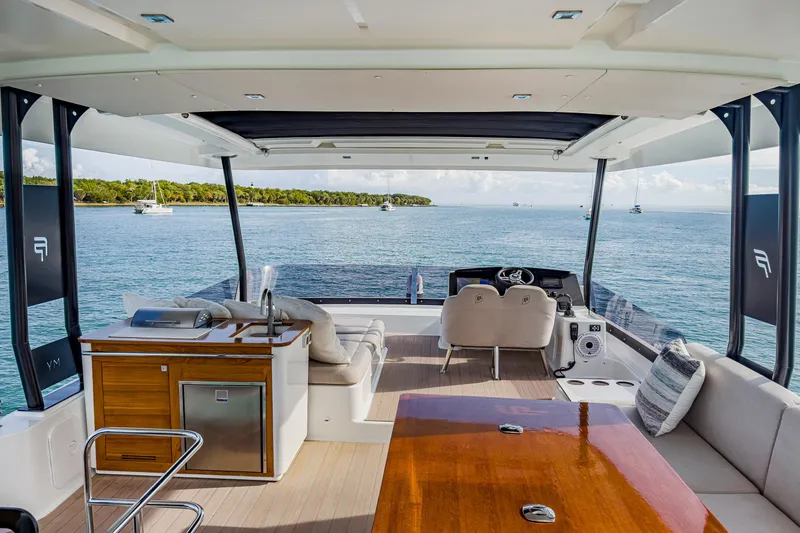 Slide: The Image of Luxurious 2022 Fountaine Pajot MY6 yacht interior with ocean view and modern amenities. - 5