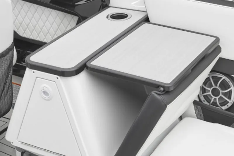 Slide: The Image of 2026 Yamaha Boats 252S interior with sleek seating and integrated speaker system. - 8
