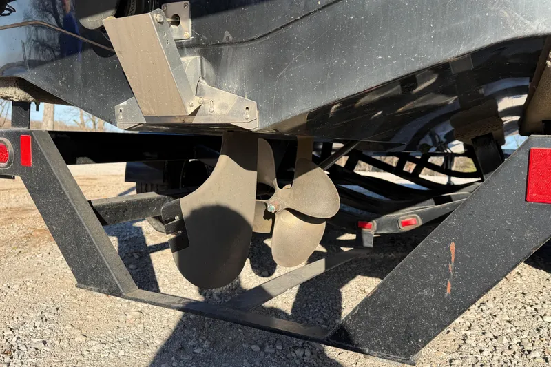 Slide: The Image of Propeller of 2008 Nautique Super Air Nautique 220 on trailer, close-up view. - 5