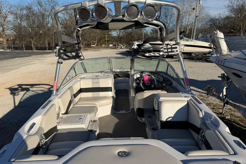 Slide: The Image of 2008 Nautique Super Air Nautique 220 boat interior with seating and speakers. - 6