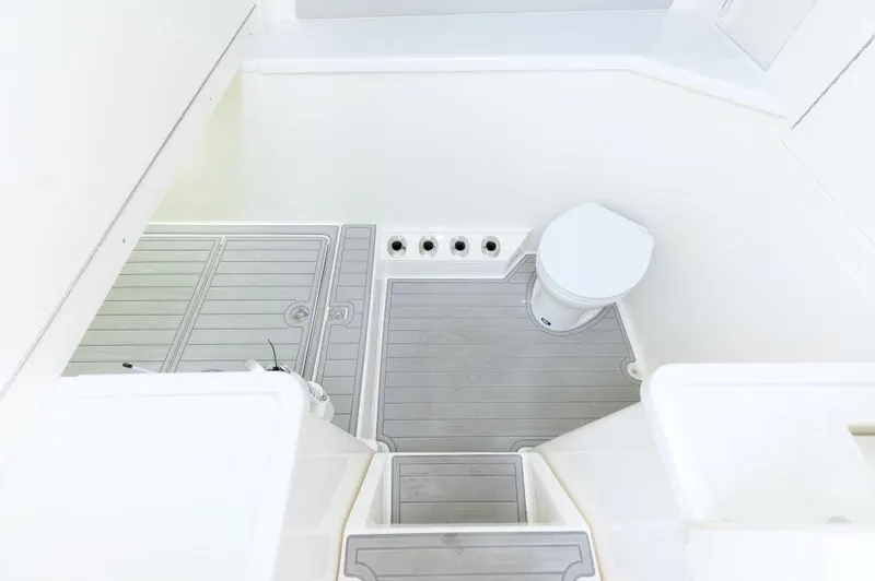 Slide: The Image of 2023 SeaVee 420Z boat interior with modern bathroom amenities. - 19