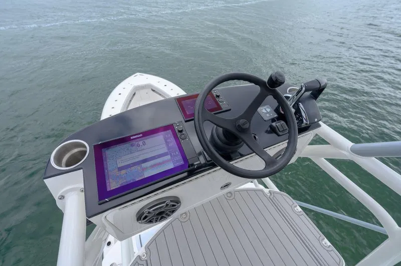 Slide: The Image of 2023 SeaVee 420Z boat helm with modern controls and navigation system. - 7