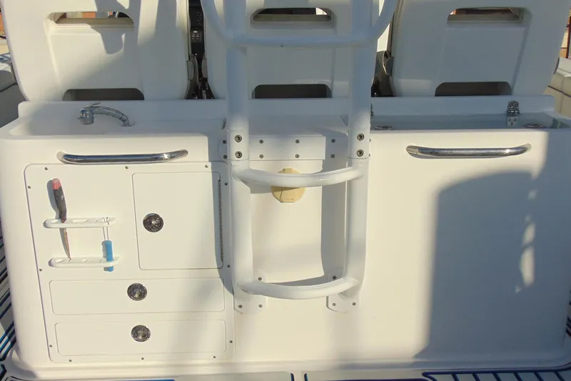 Slide: The Image of 2019 Stamas 390 Tarpon boat interior with storage compartments and ladder. - 25