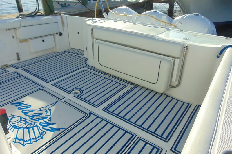 Slide: The Image of 2019 Stamas 390 Tarpon boat deck with striped flooring and storage compartments. - 30