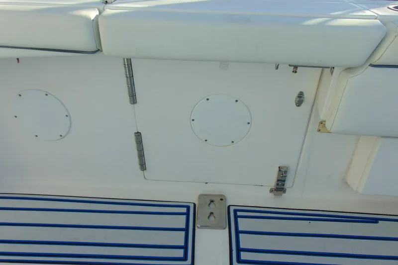 Slide: The Image of 2019 Stamas 390 Tarpon boat interior with white seating and blue-striped flooring. - 31