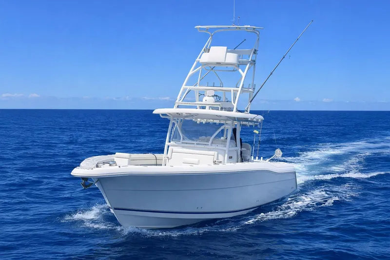 Slide: The Image of 2019 Stamas 390 Tarpon boat cruising on open blue ocean. - 4